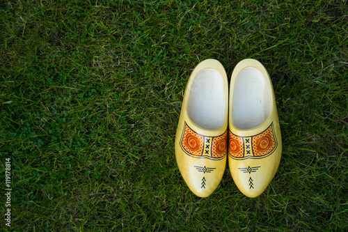 Traditional Dutch wooden shoe clogs on grass