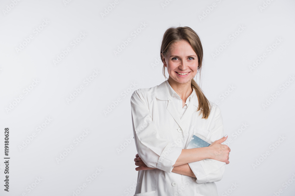 Portrait of happy clinician looking at camera and smiling with hands crossed Portrait of happy clinician looking at camera and smiling with hands crossed