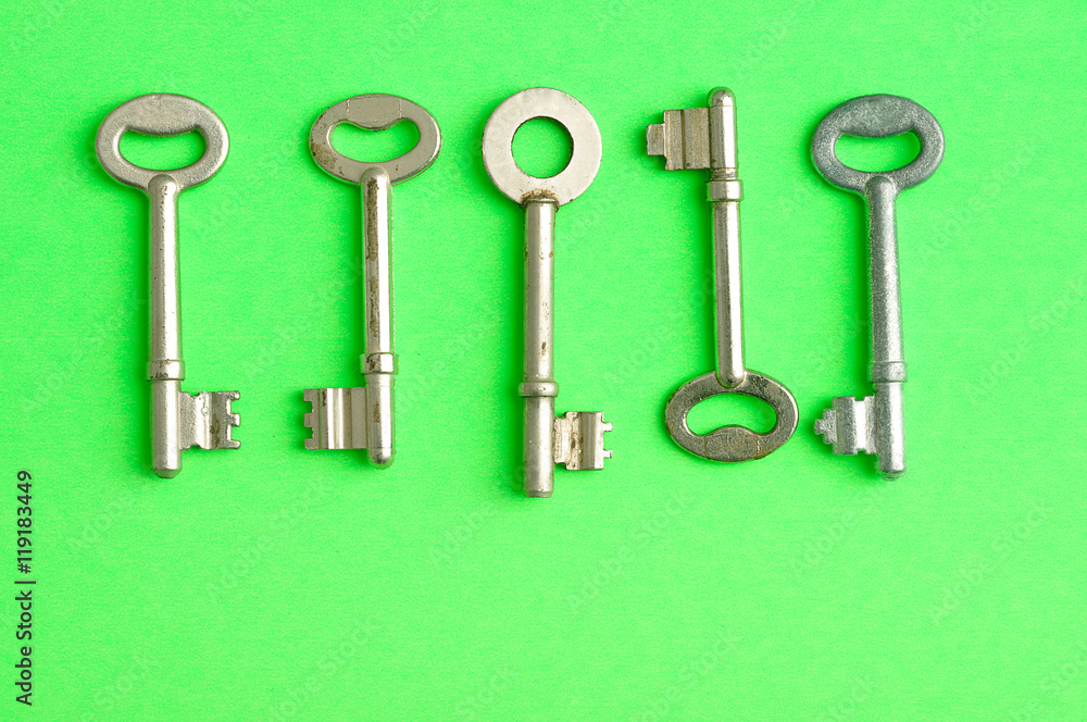 A border of keys displayed on a green background A border of keys displayed on a green background
