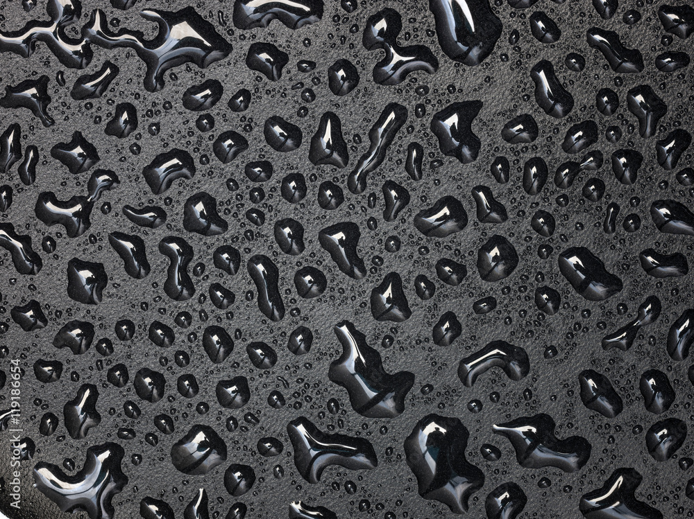 Abstract drops of water on black leather texture Abstract drops of water on black leather texture