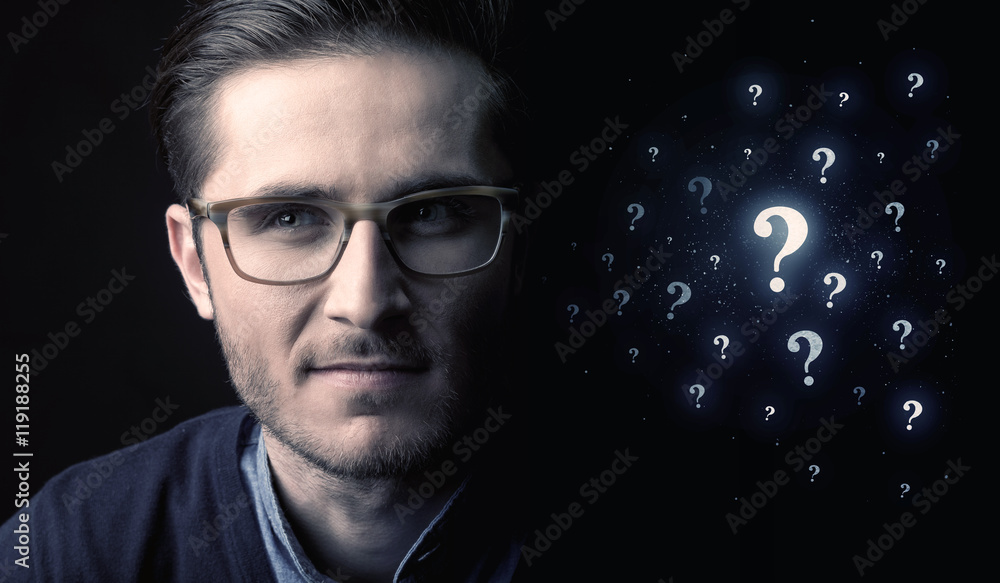 man with many question mark near him