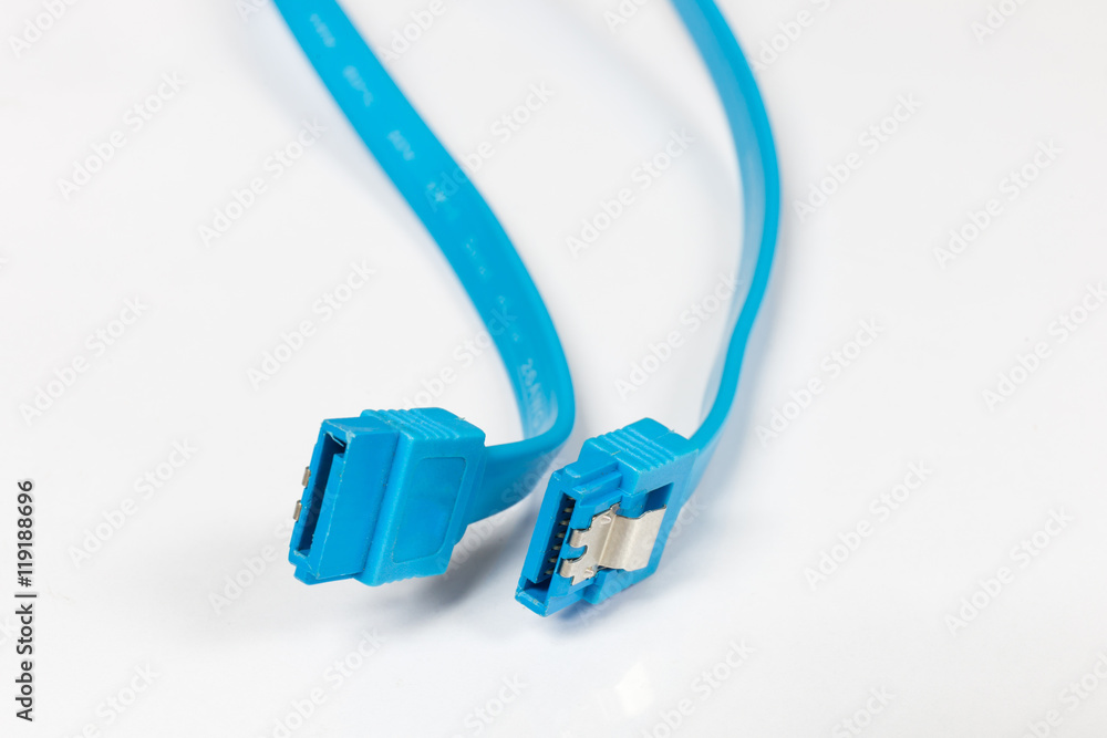 Closeup SATA Data Cable on a White Background. Select focus Closeup SATA Data Cable on a White Background. Select focus