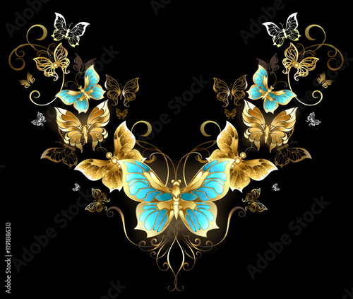 Obraz na plátně Symmetrical pattern of golden butterflies