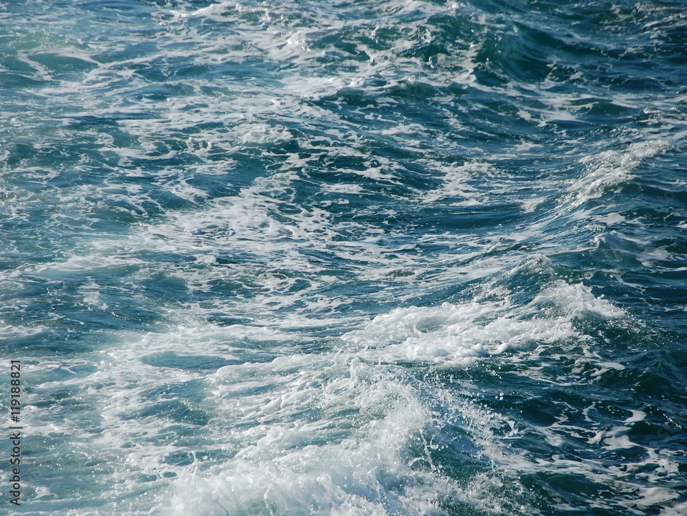 Deep sea foaming  surface background, close up