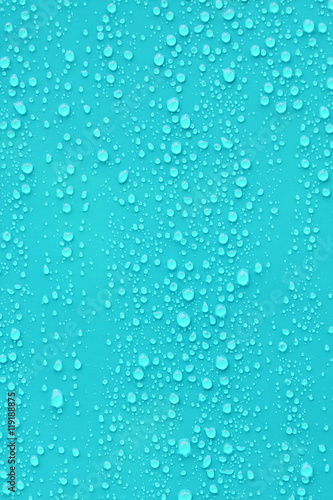 Close up water drop on blue background.