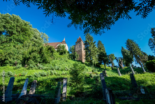 Ropemakers Tower and Church on the Hill in Sighisoara town in Romania photo