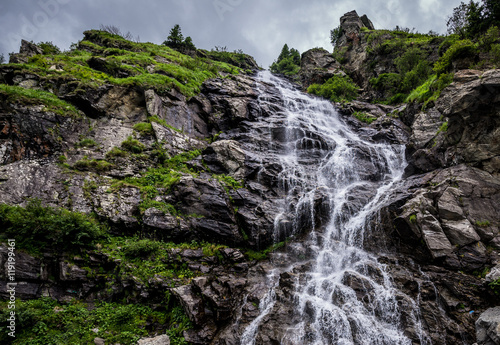 Capra Waterfall next to Transfagarasan Road in southern section of Carpathian Mountains in Romania