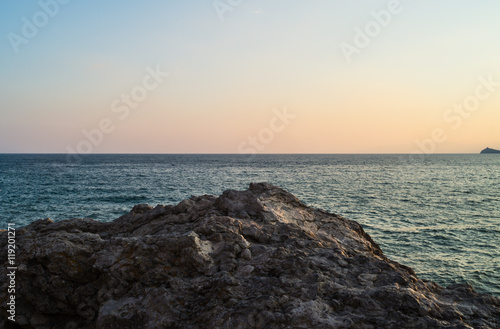 Sea and rocks at sunset