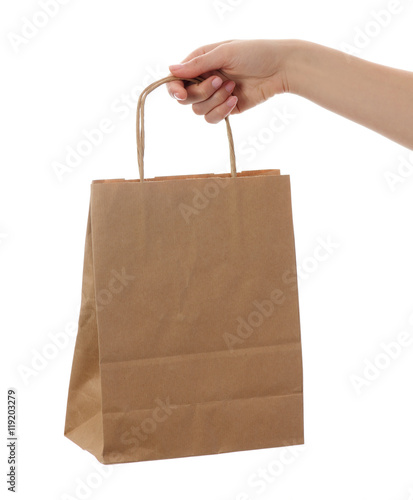 hand with paper bag