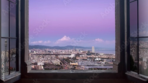 barcelona cityscape as seen from behind a window day to night timelapse at the sunset to night city lighting up  panorama traffic rushing 4k