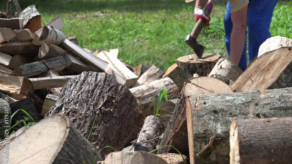 blurred farmer man chop wood with axe. 4K blurred farmer man chop wood with axe. 4K