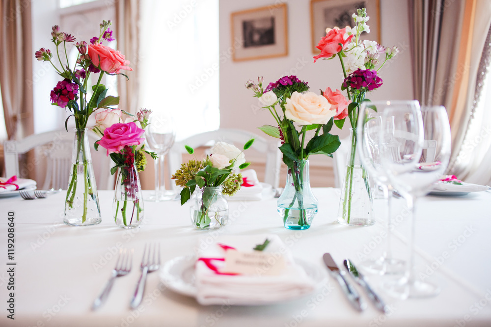 Wedding banquet, small restaurant. Floral decor in red, informal style. Wedding banquet, small restaurant. Floral decor in red, informal style.