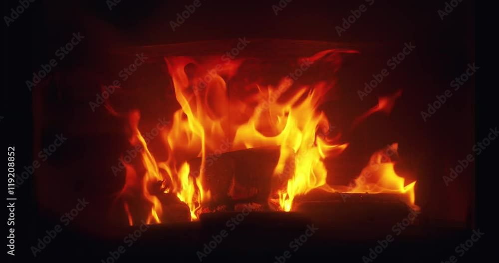 closeup fire flames in fireplace closeup fire flames in fireplace