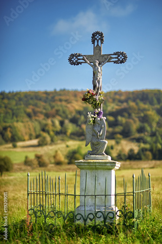 Old, stony Orthodox cross. Lemko. Beskid Mountains. Bartne, Pola photo