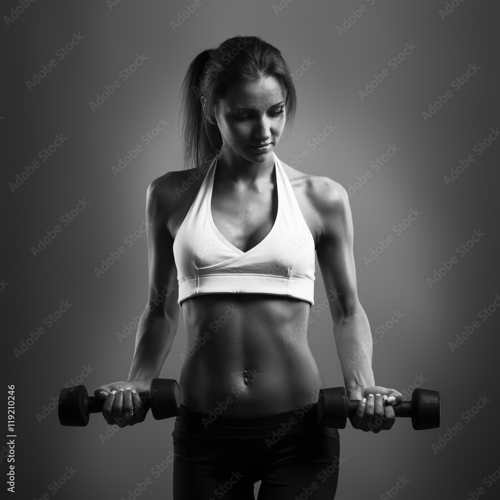 beautiful fitness female posing on studio background beautiful fitness female posing on studio background