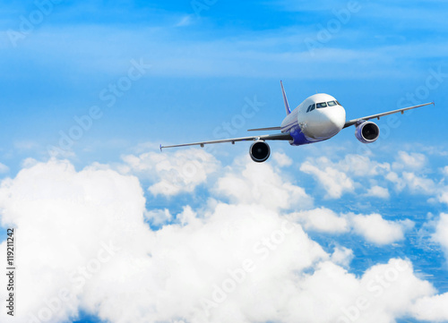 Airplane with background of cloudy sky, exploration conceptual