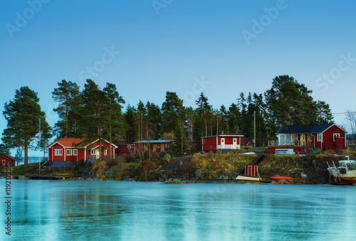 Fisherman village in Sweden at winter after sunset - winter seasonal scandinavian background