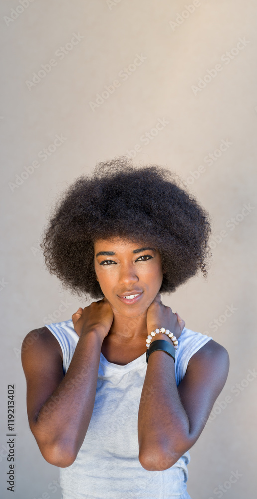 Close up portrait of a cute african american girl with afro hair Close up portrait of a cute african american girl with afro hair