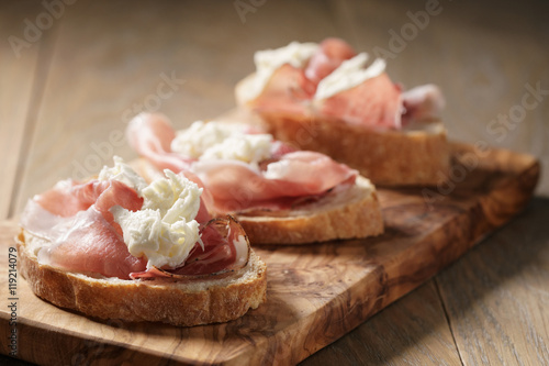 simple ciabatta slices with speck and mozzarella