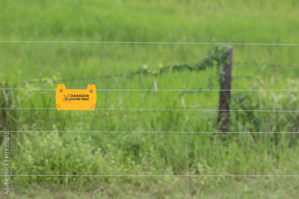 Warning on electric fence to prevent electric shock Stock Photo Adobe