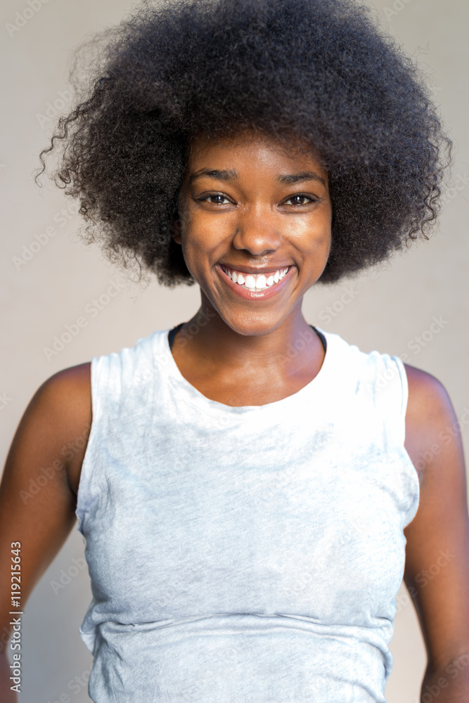 Portrait of a beautiful young African woman smiling. Portrait of a beautiful young African woman smiling.