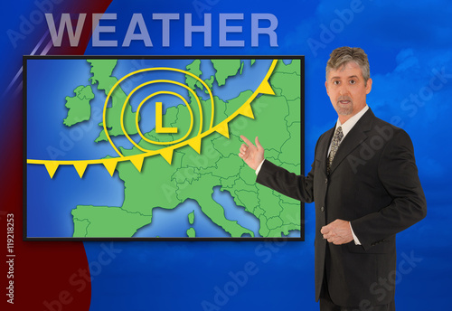 A tv television news weather meteorologist anchorman is reporting with a colorful European map and weather graphics on the monitor screen.