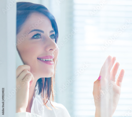 Free Download young woman with mobile phone - GFXLoad