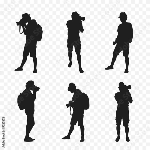 Silhouette of a tourist with a camera