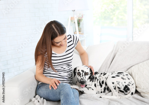Owner with her dalmatian do...