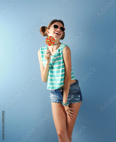 Beautiful girl with candy o...