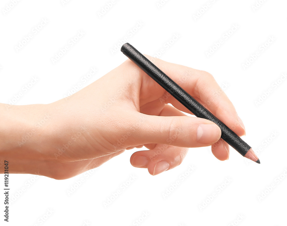 Female hand holding eye shadow pencil, isolated on white Female hand holding eye shadow pencil, isolated on white