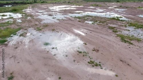 Aerial shot : fly through muddy roads photo