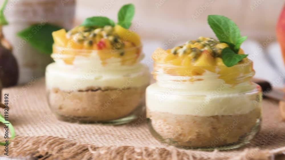 Desert with yogurt and passion fruit top on wooden table. Desert with yogurt and passion fruit top on wooden table.