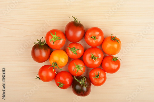 Tomato on wooden background