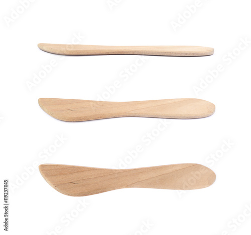 Wooden butter knife isolated photo
