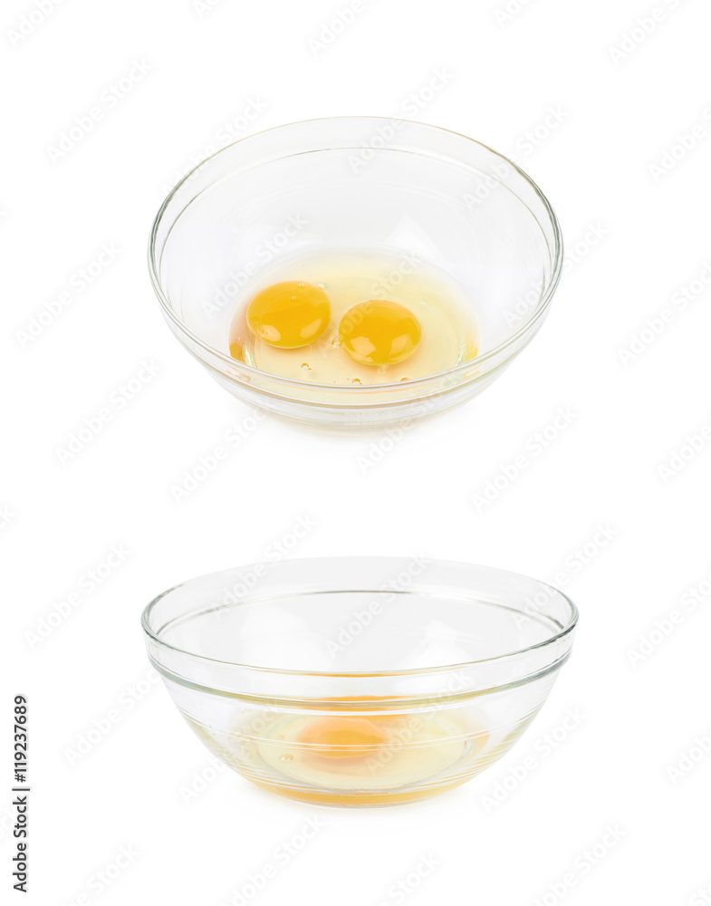 Two cracked eggs in a bowl isolated Two cracked eggs in a bowl isolated