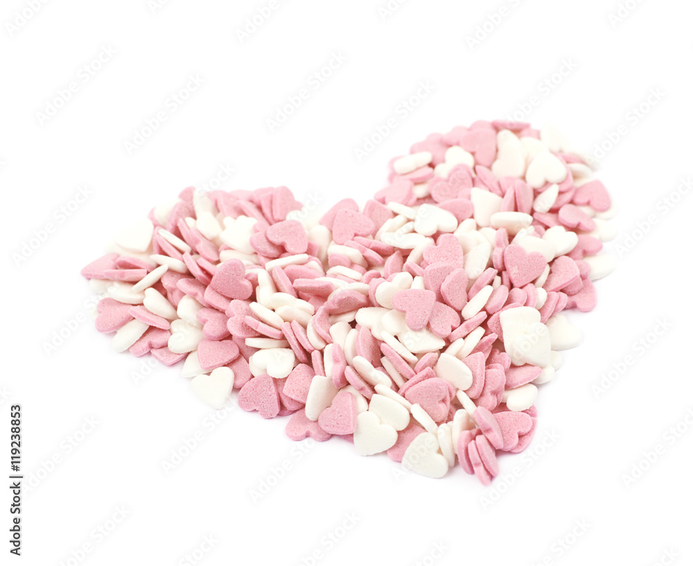 Heart shape made of sprinkles isolated