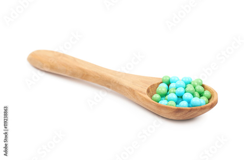 Spoon full of sprinkles isolated