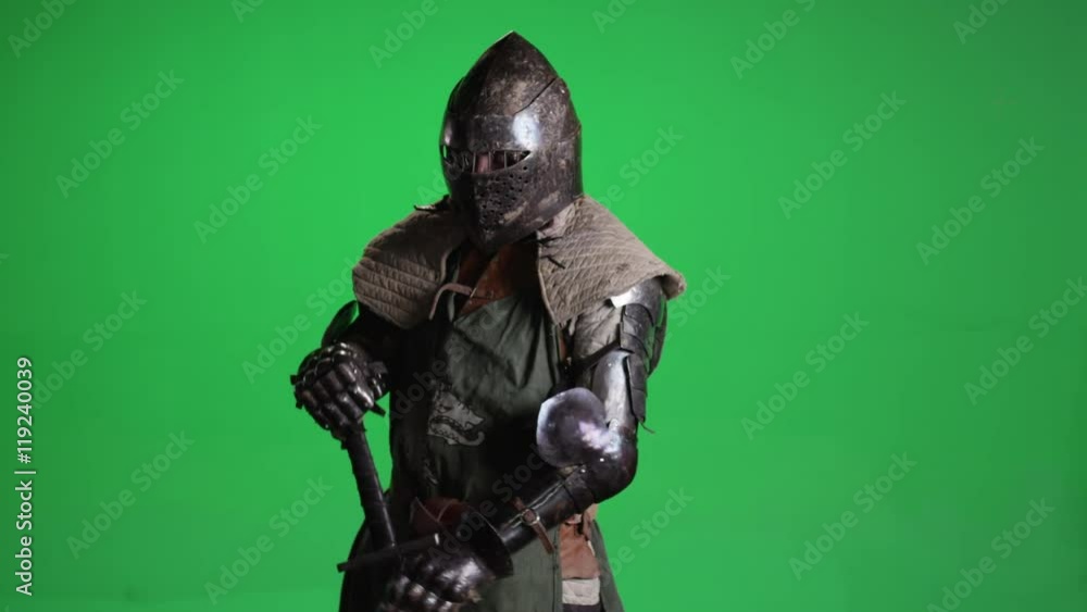 Knight in Armor with Sword on a Green Screen Knight in Armor with Sword on a Green Screen