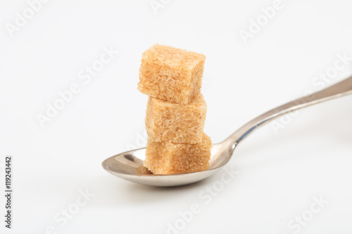 Sugar cubes in a spoon