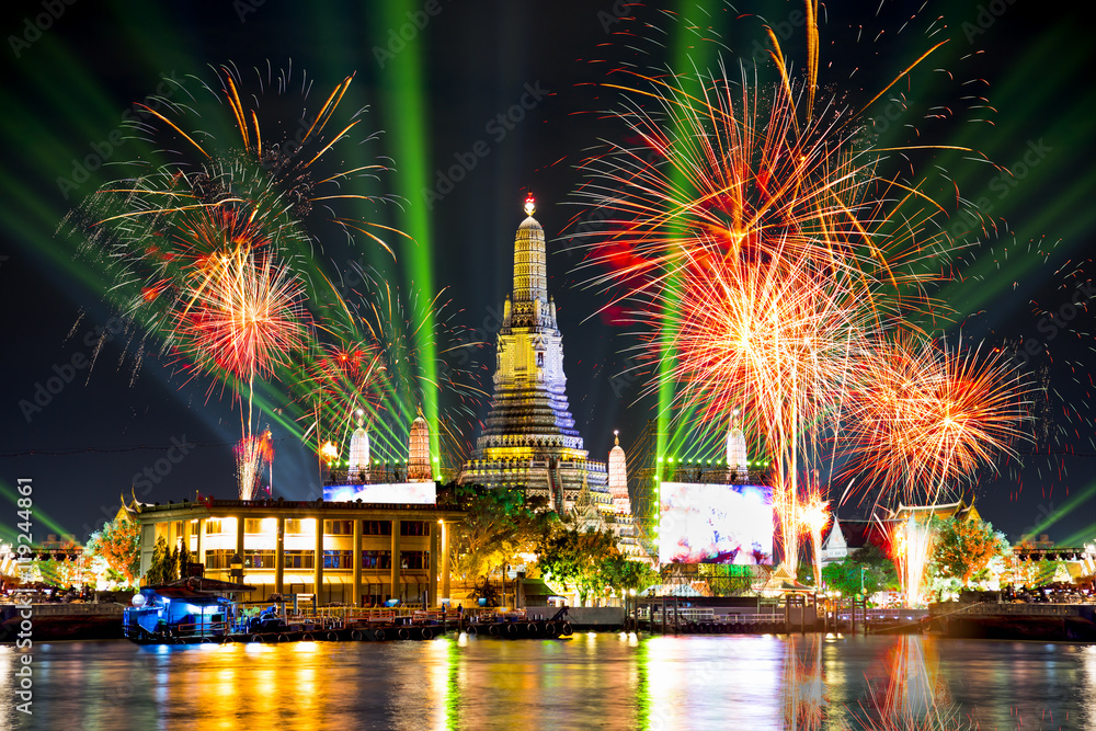 Wat Arun Temple with fireworks and laser lighting effects