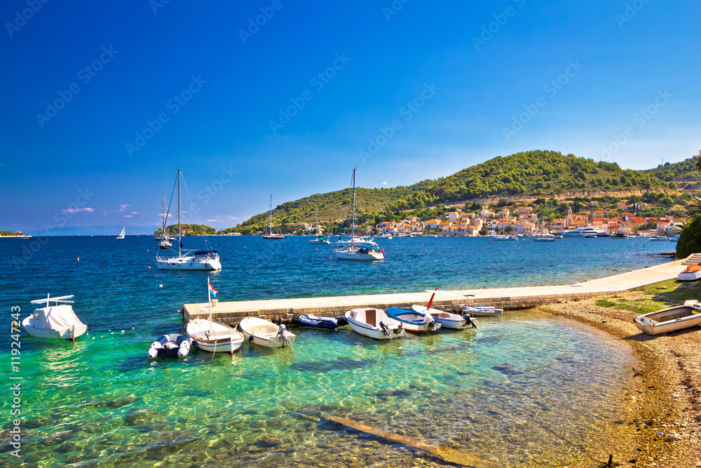 Turquoise beach and small harbor on Vis