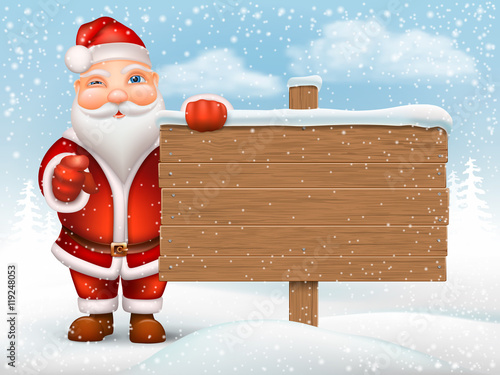 Santa Claus holding a wooden signpost on the background of the snow drifts.