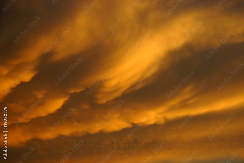 Orange cloud at sunset sky.