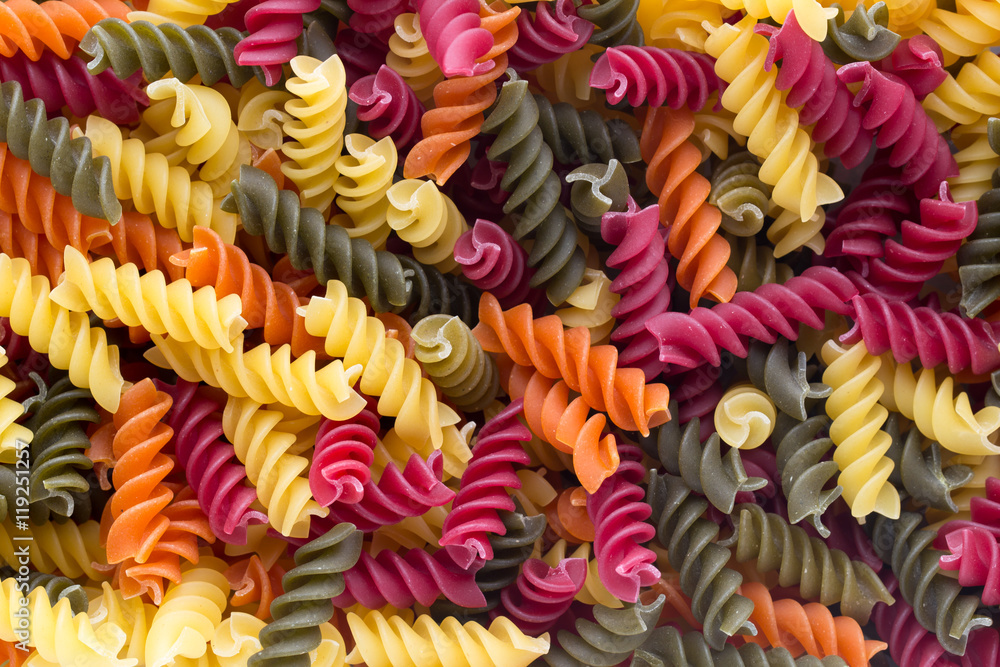 Closeup of raw eco macaroni pasta background. Closeup of raw eco macaroni pasta background.