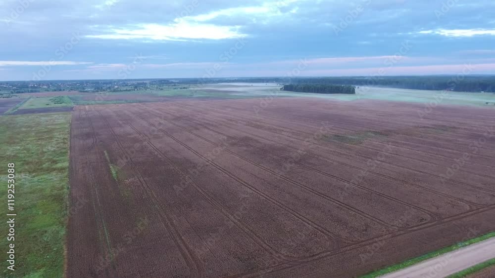 misty fields in morning birds eye view misty fields in morning birds eye view