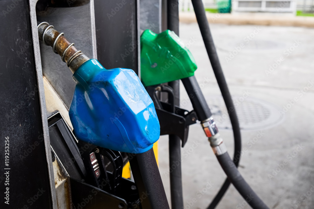 Fuel oil dispenser at petrol filling station. Fuel oil dispenser at petrol filling station.