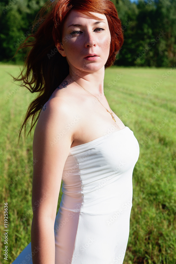 Girl in a white dress and sunny day Girl in a white dress and sunny day