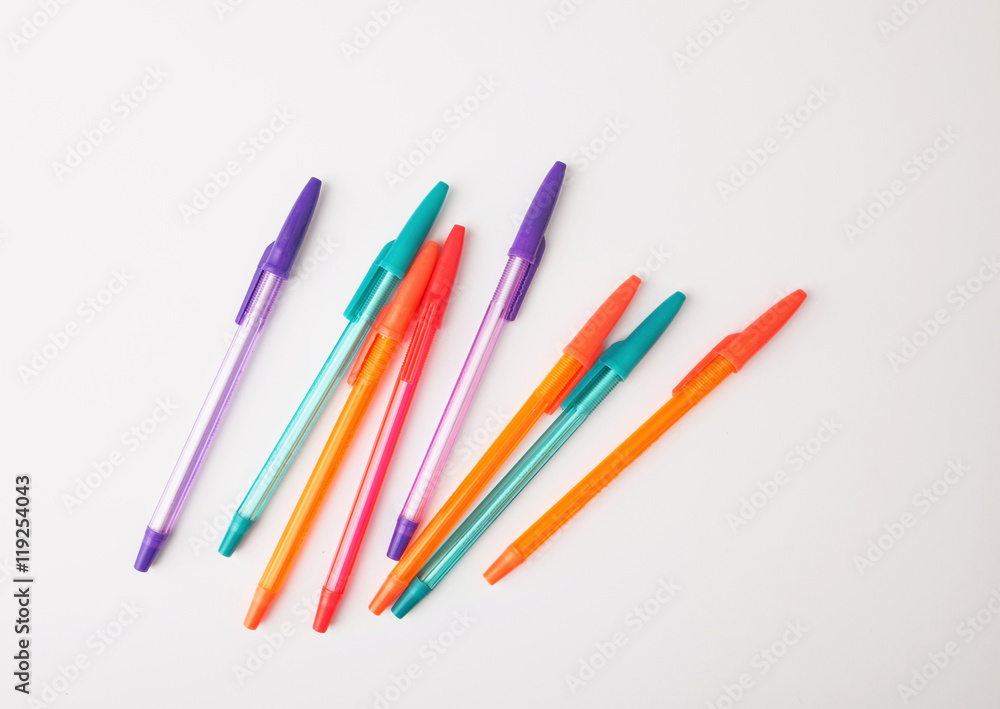 ballpoint pens of different colors on a white background ballpoint pens of different colors on a white background