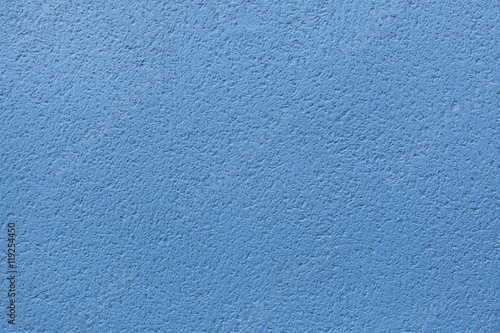 Blue painted stucco wall. Background texture